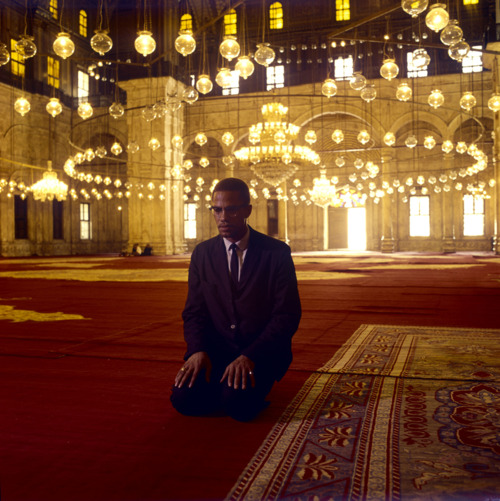 Malcolm X Praying | Why Do Muslims Go to Hajj in Mecca?